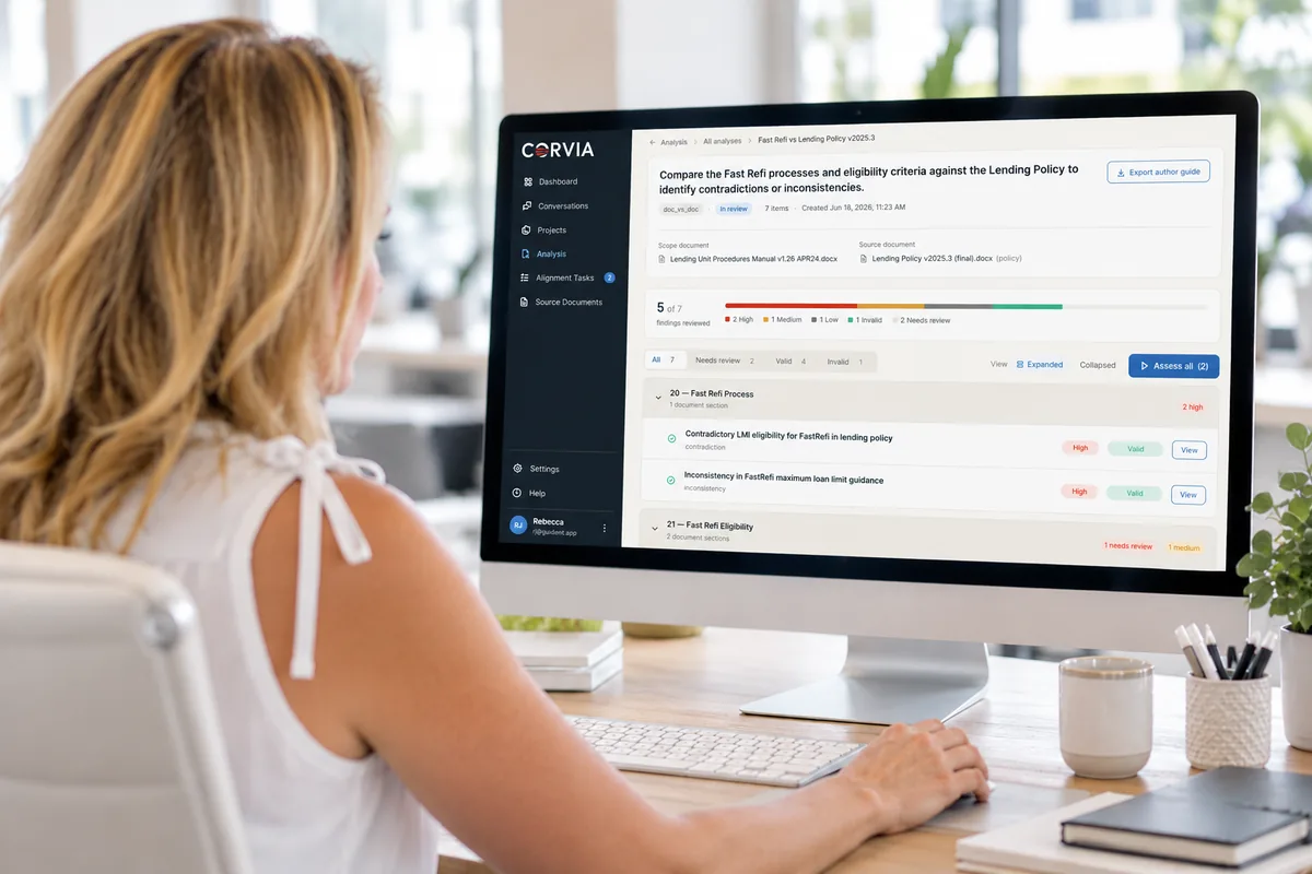 A Guident team member reviewing a Corvia analysis on a desktop screen
